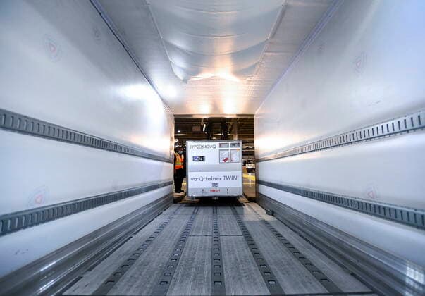 March 24, 2021, Toronto, on, Canada: A FedEx worker loads the 255,600 doses of the Moderna COVID-19 vaccine which came from Europe into a freezer trailer to be transported during the COVID-19 pandemic at Pearson International Airport in Toronto on Wednesday, March 24, 2021. Toronto Canada  - ZUMAc35_ 20210324_zaf_c35_011 Copyright: xNathanxDenettex