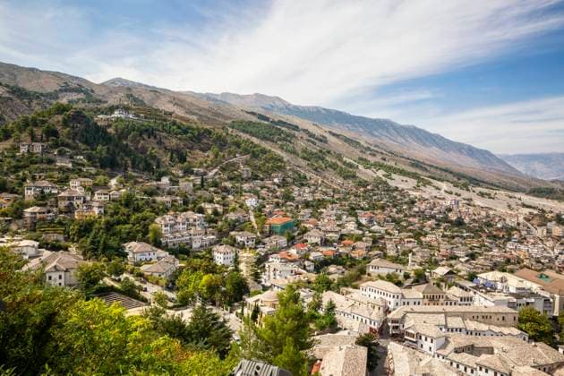 Old town amidst trees against cloud sky at Mali I Gjere, Gjirokaster, Albania MAMF01640