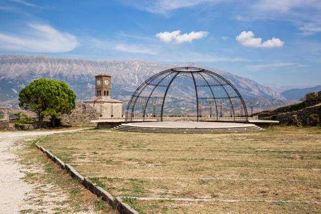Clock tower by tunnel against sky at Gjirokaster, Albania MAMF01641