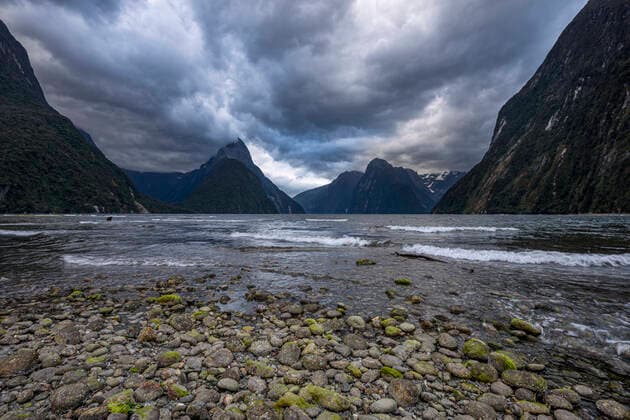 Creative Highlights World New Zealand, Fiordland, Storm clouds over scenic coastline of Milford Sound RUEF03226