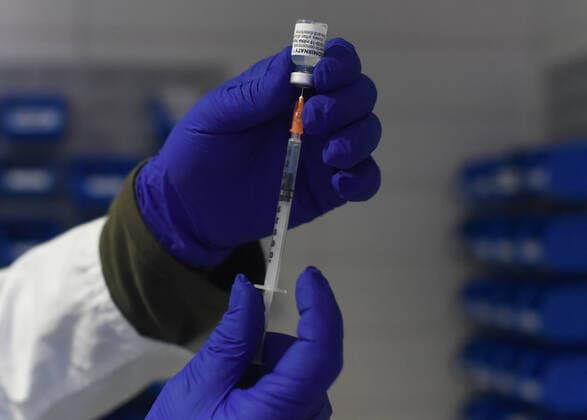 March 24, 2021, Coria, Caceres, Spain: Coria City Hospital nurse, Raul Martin, gets the syringes with the dose ready during the first day of the Astra Zeneca vaccine administration. Coria Spain - ZUMAs197 20210324_zaa_s197_080 Copyright: xGustavoxValientex