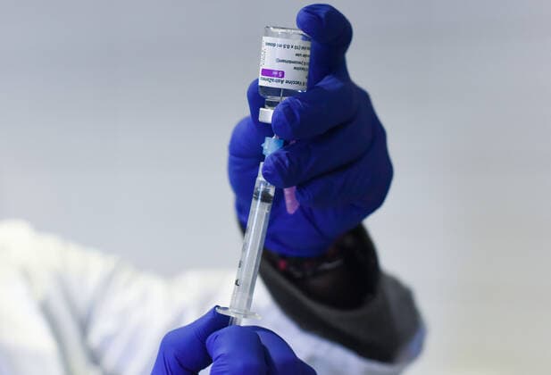 March 24, 2021, Coria, Caceres, Spain: Coria City Hospital nurse, Raul Martin, gets the syringes ready with the Astra Zeneca dose, during the first day of the Astra Zeneca vaccine administration. Coria Spain - ZUMAs197 20210324_zaa_s197_091 Copyright: xGustavoxValientex