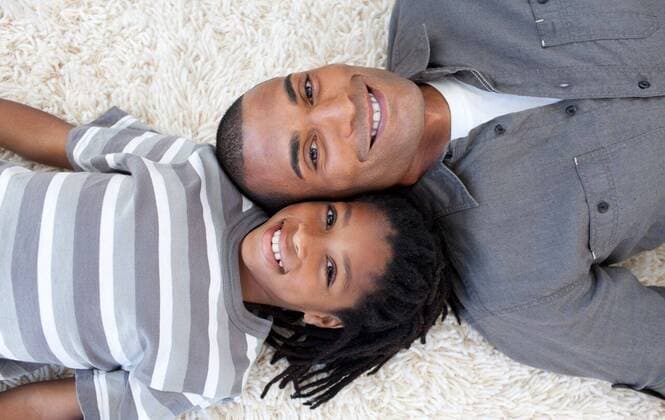 Smiling father and son relaxing on the floor Smiling father and son relaxing on the floor at home, model released, Cape Town, South Africa, 2009-10-20T23:00:00.000Z, 19725.jpg, beautiful, casual, concept, couple, dad, face, family, father, floor, fun, happy, heads, home, household, joy, kid, life, love, lying, parent, sleep, sleeping, smiling, son, teamwork, together, togetherness, white, relaxing, circle, relax, relaxing 20s, Young Adult, Man, Male, Mixed-Race, Child, Boy, Black, Mixed Race Person, 25-29 Years, Young Men, African ethnicity, 8-9 Years, Boys