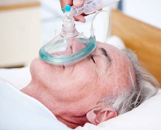 Senior patient receiving oxygen mask Senior patient receiving oxygen mask lying on a hospital bed, model released, Cape Town, South Africa, 2009-10-01T23:00:00.000Z, 22587.jpg, confident, self assured, assertive, stethoscope, scalpel, hospital, nurse, professional, medicine, medical, team, doctor, clinic, occupation, clinical, specialist, worker, operation, oxygen, mask, patient, healthcare, equipment, emergency, health, care, accident, attack, urgent, resuscitation, reanimation, anesthetic, anesthesia 40s, Mature Adult, Man, Male, Caucasian, Caucasian Appearance, 45-49 Years, Mature Men