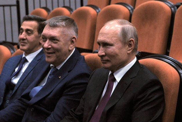 MOSCOW, RUSSIA - MARCH 25, 2021: Russia s President Vladimir Putin, Alexander Fyodorov and Mayrbek Matayev (R-L), Artistic Director and Ballet Master of the Children s Musical Theatre of Youth Acting respectively, visit the theatre s new building to mark Cultural Worker s Day celebrated in Russia on March 25. Mikhail Klimentyev Russian Presidential Press and Information Office TASS  TS0FA79B