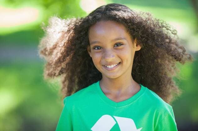 Young environmental activist smiling at the camera on a sunny Young environmental activist smiling at the camera day, model released, Cape Town, South Africa, 31.01.2014, 332224.jpg, park, countryside, nature, parkland, lawn, green, grass, grassland, sunny, sunlight, sunshine, summer, spring, wearing, t-shirt, ecology, recycling, environment, climate, recycle, eco, eco friendly, conservation, global, earth, awareness, issue, activist, activism, happy, smiling, cheerful, cute, childhood, portrait Child, Girl, Female, Mixed-Race, 8-9 Years, Girls, Mixed-Race Person Outdoors,Front view,Looking at camera,Day,Head and shoulders