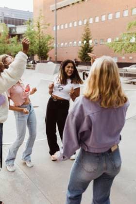 Happy female teenager friends dancing at skate park Sweden,Stockholm, model released Copyright: xMaskotx , MA85375