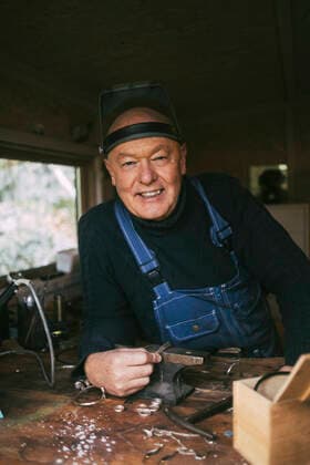 Portrait of smiling male mechanic at workshop Sweden, Varmdo, model released, property released Copyright: xMaskotx , MA85481