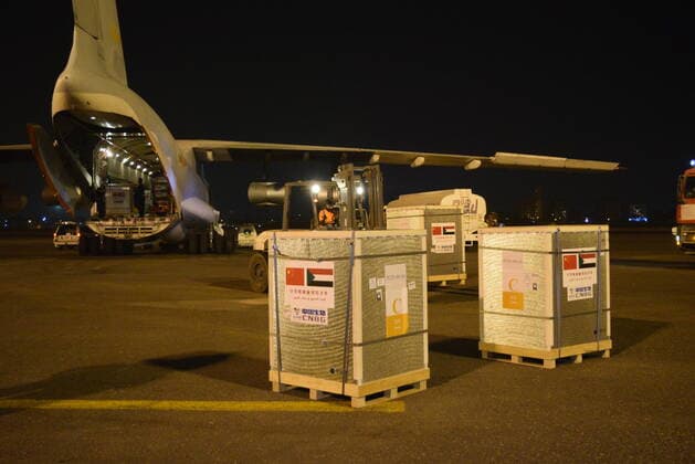 (210327) -- KHARTOUM, March 27, 2021 -- Chinese vaccines are unloaded from a plane at the Khartoum International Airport in Khartoum, Sudan, March 26, 2021. A batch of China s Sinopharm COVID-19 vaccines, donated by the Chinese government to Sudan, arrived here on Friday. ) SUDAN-KHARTOUM-CHINESE VACCINE-ARRIVAL MaxYichong 