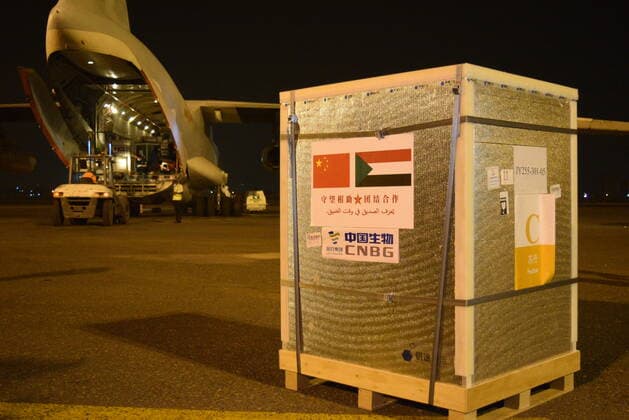 (210327) -- KHARTOUM, March 27, 2021 -- Chinese vaccines are unloaded from a plane at the Khartoum International Airport in Khartoum, Sudan, March 26, 2021. A batch of China s Sinopharm COVID-19 vaccines, donated by the Chinese government to Sudan, arrived here on Friday. ) SUDAN-KHARTOUM-CHINESE VACCINE-ARRIVAL MaxYichong 