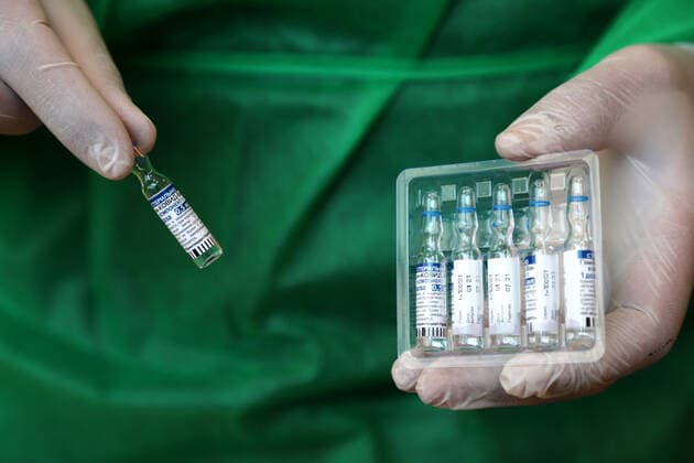 March 27, 2021, Gaza city, Gaza Strip, Palestinian Territory: Palestinians receive the dose of the coronavirus disease (COVID-19) vaccine at the UNRWA clininc, in Gaza city on March 27, 2021. The Palestinian authorities have begun administering vaccines supplied under the international Covax vaccine-sharing scheme, as infections continue to rise sharply in the West Bank and Gaza Gaza city Palestinian Territory - ZUMAap3_ 20210327_zaf_ap3_005 Copyright: xMahmoudxAjjourx