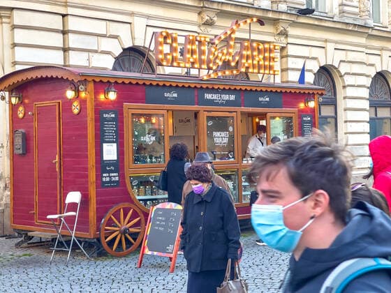 Old town with restaurants and bars with tourists and local people in Bucharest, Romania on March 27, 2021.