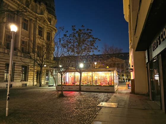 Old town with restaurants and bars with tourists and local people in Bucharest, Romania on March 27, 2021.