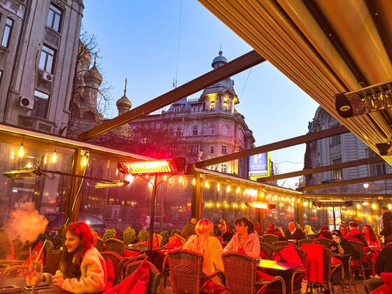 Old town with restaurants and bars with tourists and local people in Bucharest, Romania on March 27, 2021.