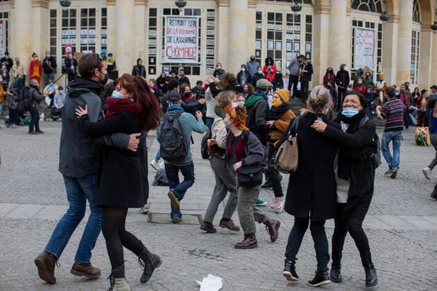People dance in a gathering in front of the Opera in Rennes, western France. March 27, 2021  Copyright: xJeremiasxGonzalezx