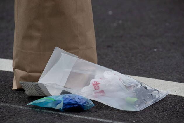 March 27, 2021, North Vancouver, BC, Canada: A police evidence bag is seen on the road where a person was taken into custody not far from the Lynn Valley Library, in North Vancouver, B.C., Saturday, March 27, 2021. Police say multiple victims were stabbed inside and outside the library today. North Vancouver Canada  - ZUMAc35_ 20210327_zaf_c35_040 Copyright: xDarrylxDyckx