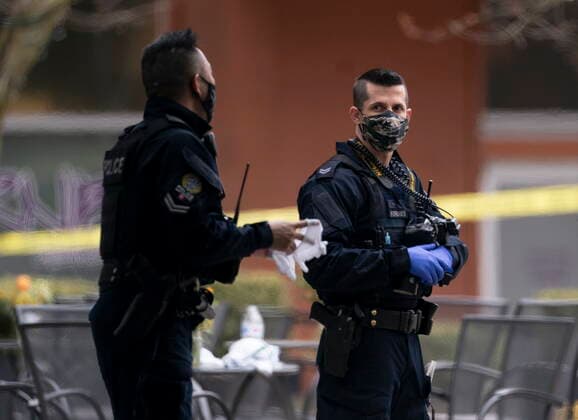 March 27, 2021, Vancouver, BC, Canada: Members of the RCMP are seen outside of the Lynn Valley Library, in North Vancouver, B.C., Saturday, March 27, 2021. Police say multiple victims were stabbed inside and outside the library today. Vancouver Canada  - ZUMAc35_ 20210327_zaf_c35_078 Copyright: xJonathanxHaywardx