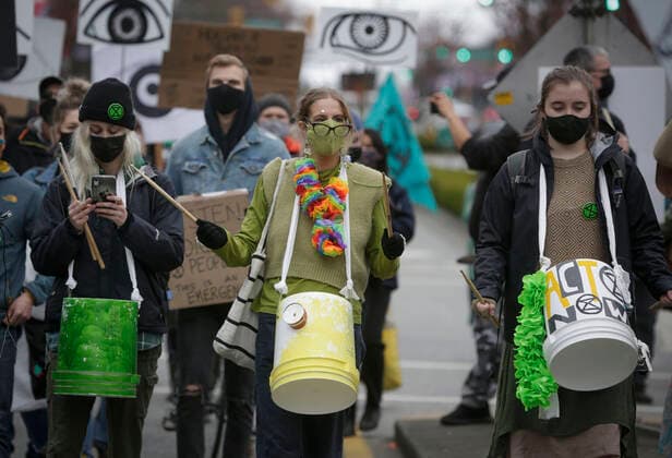 (210327) -- VANCOUVER, March 27, 2021 -- People take part in a climate change protest in Vancouver, British Columbia, Canada, on March 27, 2021. (Photo by Xinhua) CANADA-VANCOUVER-CLIMATE CHANGE-PROTEST LiangxSen 