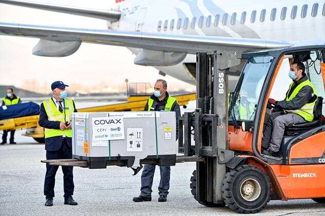 (210328) -- SKOPJE, March 28, 2021 -- Workers load North Macedonia s first batch of AstraZeneca s COVID-19 vaccines received through the UN-backed Covax program, at Skopje s International Airport in Skopje, North Macedonia, March 28, 2021. (Photo by Xinhua) NORTH MACEDONIA-SKOPJE-COVID-19-VACCINE TomislavxGeorgiev 