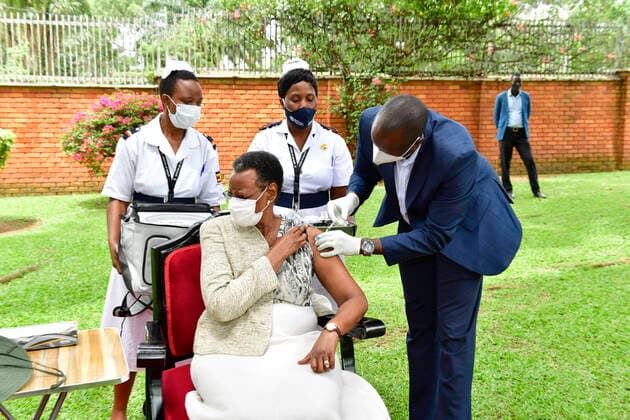 (210328) -- KAMPALA, March 28, 2021 -- Ugandan President Yoweri Museveni s wife Janet Museveni receives the COVID-19 vaccine at State House in Kampala, Uganda, on March 27, 2021. Ugandan President Yoweri Museveni and his wife Janet Museveni received their first dose of the Oxford-AstraZeneca vaccines here on Saturday. (Photo by Xinhua) UGANDA-KAMPALA-PRESIDENT-COVID-19 VACCINATION JosephxKiggundu 