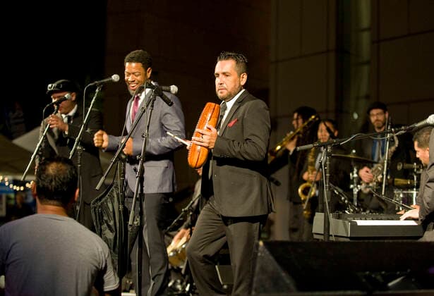 March 28, 2021, Costa Mesa, California, USA: Boogaloo Assassins perform in the plaza at the Segerstrom Center for the Arts. The Boogaloo Assassins is a12 piece Boogaloo, Salsa and Latin Soul group from Los Angeles, California. Costa Mesa USA - ZUMAk145 20210328_zap_k145_091 Copyright: xNicholasxKoonx