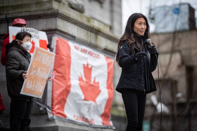 March 28, 2021, Vancouver, BC, Canada: Korean-American journalist Eileen Park Robertson, who is married to former Vancouver mayor Gregor Robertson, addresses the crowd during a rally opposing discrimination against Asian communities and to mourn the victims of those affected by the Atlanta shootings, in Vancouver, B.C., on Sunday, March 28, 2021. Vancouver Canada - ZUMAc35_ 20210328_zaf_c35_136 Copyright: xDarrylxDyckx