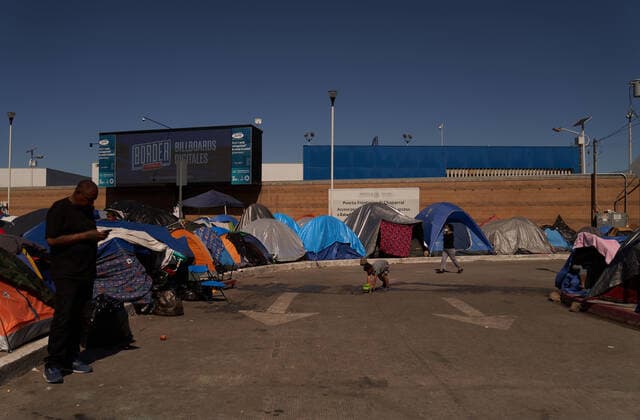 March 28, 2021, Tijuana, Mexico: Migrants from Central America are stuck living in tents on the street in Tijuana, Mexico on the border while they wait for President Joe Biden to open the American border. Tijuana Mexico - ZUMAd211 20210328_zap_d211_004 Copyright: xAllisonxDinnerx