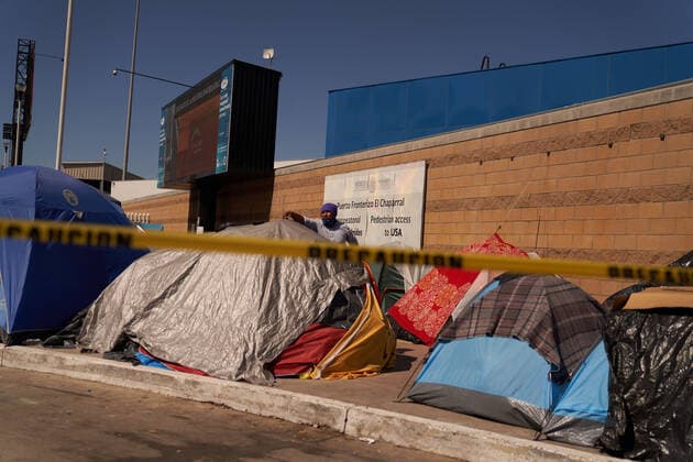 March 28, 2021, Tijuana, Mexico: Migrants from Central America are stuck living in tents on the street in Tijuana, Mexico on the border while they wait for President Joe Biden to open the American border. Tijuana Mexico - ZUMAd211 20210328_zap_d211_012 Copyright: xAllisonxDinnerx