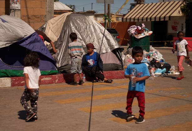 March 28, 2021, Tijuana, Mexico: Migrants from Central America are stuck living in tents on the street in Tijuana, Mexico on the border while they wait for President Joe Biden to open the American border. Tijuana Mexico - ZUMAd211 20210328_zap_d211_014 Copyright: xAllisonxDinnerx