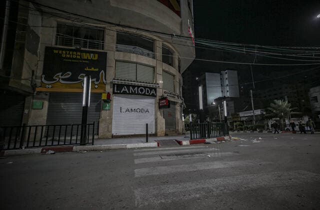 March 28, 2021, Gaza city, The Gaza Strip, Palestine: Empty streets amid a coronavirus lockdown from 9:00 PM to 6:00 AM in Gaza City, 27 March 2021. The Ministry of Interior in Gaza City announced new measures on .25 March 2021, as number of coronavirus positive cases increase. Gaza city Palestine - ZUMAq100 20210328_zaa_q100_049 Copyright: xAbedxAlrahmanxAlkahloutx