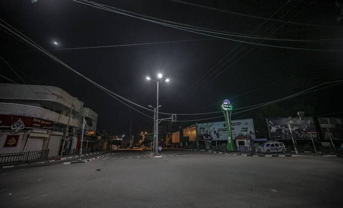 March 28, 2021, Gaza city, The Gaza Strip, Palestine: Empty streets amid a coronavirus lockdown from 9:00 PM to 6:00 AM in Gaza City, 27 March 2021. The Ministry of Interior in Gaza City announced new measures on .25 March 2021, as number of coronavirus positive cases increase. Gaza city Palestine - ZUMAq100 20210328_zaa_q100_052 Copyright: xAbedxAlrahmanxAlkahloutx