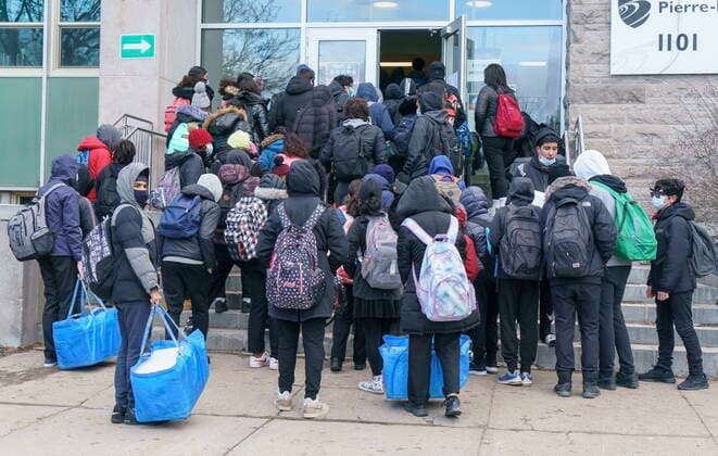 March 29, 2021, Montreal, PQ, Canada: Students enter the Pierre Laporte Secondary School as secondary school students return to class full time during the COVID-19 pandemic in Montreal, on Monday, March 29, 2021. Montreal Canada  - ZUMAc35_ 20210329_zaf_c35_001 Copyright: xPaulxChiassonx
