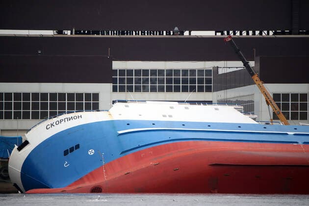 OTRADNOYE, LENINGRAD REGION, RUSSIA - MARCH 30, 2021: The heeled over Skorpion trawler is pictured at the Pella Shipyard. The vessel that is under construction, heeled over and the holds were flooded on March 30. Six workers were able to evacuate; a rescue operation for two people is underway. Peter Kovalev TASS  TS0FB013