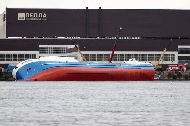 OTRADNOYE, LENINGRAD REGION, RUSSIA - MARCH 30, 2021: The heeled over Skorpion trawler is pictured at the Pella Shipyard. The vessel that is under construction, heeled over and the holds were flooded on March 30. Six workers were able to evacuate; a rescue operation for two people is underway. Peter Kovalev TASS  TS0FB014