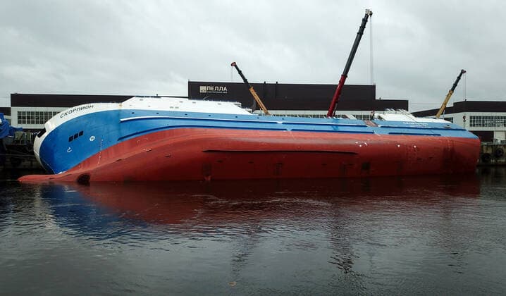 OTRADNOYE, LENINGRAD REGION, RUSSIA - MARCH 30, 2021: The heeled over Skorpion trawler is pictured at the Pella Shipyard. The vessel that is under construction, heeled over and the holds were flooded on March 30. Six workers were able to evacuate; a rescue operation for two people is underway. Peter Kovalev TASS  TS0FB018