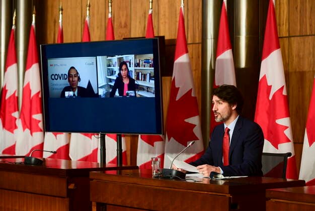 March 30, 2021, Ottawa, on, Canada: Prime Minister Justin Trudeau holds a press conference during the COVID-19 pandemic in Ottawa on Tuesday, March 30, 2021. He is joined virtually by Dr. Howard Njoo, Deputy Chief Public Health Officer, and Minister of Public Services and Procurement Anita Anand. Ottawa Canada  - ZUMAc35_ 20210330_zaf_c35_024 Copyright: xSeanxKilpatrickx