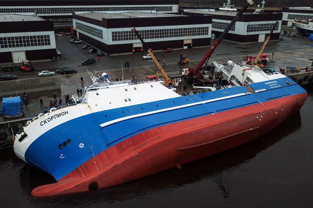 OTRADNOYE, LENINGRAD REGION, RUSSIA - MARCH 30, 2021: The heeled over Skorpion trawler is pictured at the Pella Shipyard. The vessel that is under construction, heeled over and the holds were flooded on March 30. Six workers were able to evacuate; a rescue operation for two people is underway. Peter Kovalev TASS  TS0FB01B