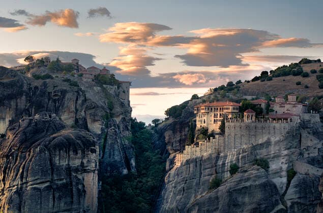 Sunset light on clouds and Varlaam and Megalo Meteoro Monasteries, Meteora, UNESCO World Heritage Site, Thessaly, Greece, Europe Copyright: FrancescoxFanti 1336-156