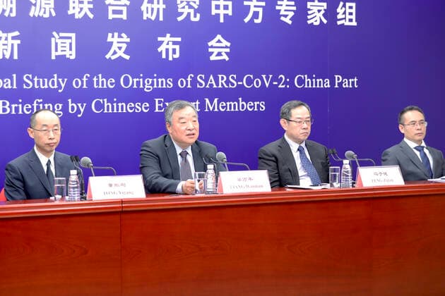 (210331) -- BEIJING, March 31, 2021 -- Chinese expert members of a WHO-China joint team introduce the report on the WHO-convened global study of COVID-19 origins at a press briefing in Beijing, capital of China, March 31, 2021. ) CHINA-BEIJING-WHO-COVID-19-ORIGINS-STUDY-PRESS BRIEFING (CN) ZhangxYuwei 