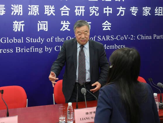 (210331) -- BEIJING, March 31, 2021 -- Liang Wannian, team leader from the Chinese side of the WHO-China team studying the origins of COVID-19, answers questions after a press briefing by the Chinese expert members of the joint study in Beijing, capital of China, March 31, 2021. ) CHINA-BEIJING-WHO-COVID-19-ORIGINS-STUDY-PRESS BRIEFING (CN) ZhangxYuwei 