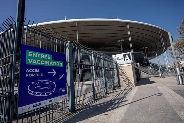 A sign indicates the entrance to the vaccination center of the Stade de France in Saint-Denis on March 31, 2021, where a Covid-19 vaccination centre will open on April 6. In order to accompany the increase of the vaccination campaign, 38 giant vaccination centers will be opened in the next few days.  Copyright: xAurelienxMorissardx