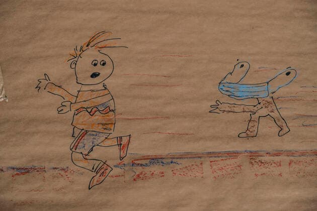 March 31, 2021, Barcelona, Catalonia, Spain: A kid s drawing against the wearing of face masks during the demonstration..Summoned by the platform against the obligation of sanitary masks in minors, El Tercer Grupo, some fifty people have gathered at the doors of the Sant Joan De Deu Children s Hospital to protest the call of the hospital to carry out tests of the covid 19 vaccine on minors. Barcelona Spain - ZUMAs197 20210331_zaa_s197_060 Copyright: xPacoxFreirex