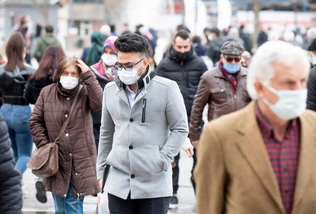 People wearing face masks walk on a street in Ankara, Turkey, on March 31, 2021. Turkey has confirmed 31,537 deaths and 3,317,182 positive cases of the coronavirus infection in the country. ( Copyright: AbdurrahmanxAntakyalix-xDepoxPho DSC_3968