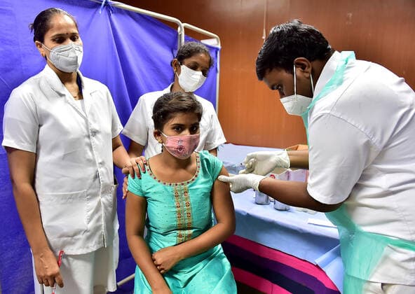(210401) -- BANGALORE, April 1, 2021 -- A woman receives the COVID-19 vaccine at a hospital in Bangalore, India, April 1, 2021. The third phase of vaccination to curb the COVID-19 pandemic began in India on Thursday, during which all people aged above 45 years would be given vaccine jabs. (Str Xinhua) INDIA-BANGALORE-COVID-19-VACCINATION Stringer 