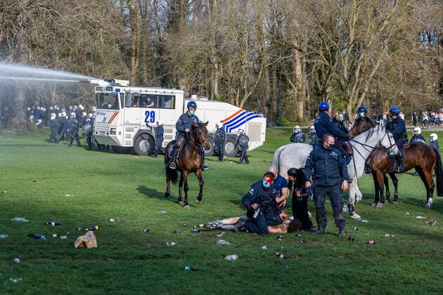 April 1, 2021, Brussels, Belgium: Protest against sanitary measures and wild party called La Boum in Brussels, social distancing was rarely respected and the wearing of masks also, a lot of tension and violence between police and demonstrators. Brussels Belgium - ZUMAb331 20210401_zaf_b331_026 Copyright: xArnaudxBrianx