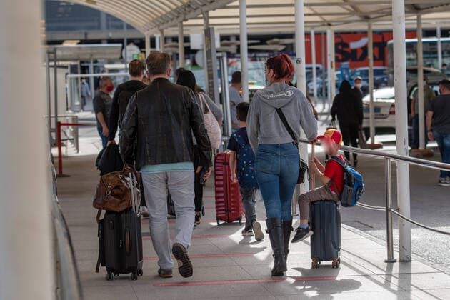 20210401 Tourists arrive at Palma de Mallorca Airport PALMA, SPAIN - APRIL 1 2021 : Tourists at Palma de Mallorca Ariport at - Tourists arrive at Palma de Mallorca Airport on April 1, 2021 in Palma, .