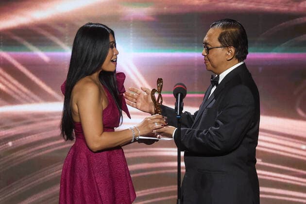MOSCOW, RUSSIA â€“ APRIL 2, 2021: Indonesian-born French singer-songwriter Anggun (L) at the 2021 BraVo music awards ceremony at the Bolshoi Theatre. BraVo is an international professional music award presented to artists for their contribution to classical art and popular music. This year, the award is presented for achievement in classical art in the past two years. Vyacheslav Prokofyev TASS  TS0FB5E3