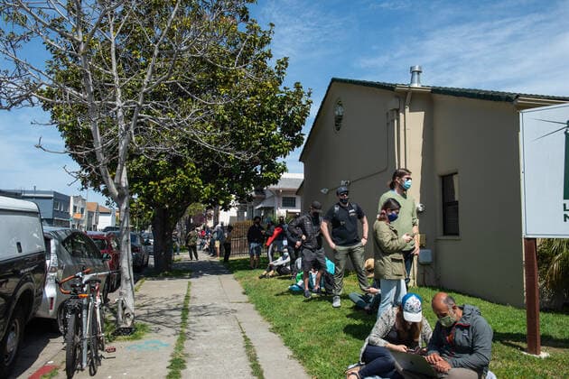 April 2, 2021, Oakland, CA, United States: People sit as they wait in cue for the Janssen COVID-19 Vaccine (Johnson & Johnson) in Oakland..A tier just opened on April 1st for vaccinations of people from age 50 and above with exceptions of 16year-olds and above with severe health conditions, these can receive vaccination. Oakland United States - ZUMAs197 20210402_zaa_s197_121 Copyright: xPatxMazzerax