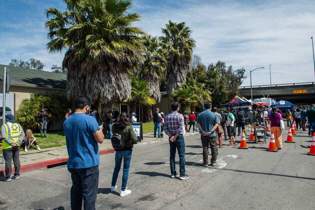 April 2, 2021, Oakland, CA, United States: Hundreds wait in cue for the Janssen COVID-19 Vaccine (Johnson & Johnson) in Oakland..A tier just opened on April 1st for vaccinations of people from age 50 and above with exceptions of 16year-olds and above with severe health conditions, these can receive vaccination. Oakland United States - ZUMAs197 20210402_zaa_s197_122 Copyright: xPatxMazzerax