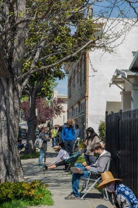April 2, 2021, Oakland, CA, United States: People sit as they wait in cue for the Janssen COVID-19 Vaccine (Johnson & Johnson) in Oakland..A tier just opened on April 1st for vaccinations of people from age 50 and above with exceptions of 16year-olds and above with severe health conditions, these can receive vaccination. Oakland United States - ZUMAs197 20210402_zaa_s197_129 Copyright: xPatxMazzerax